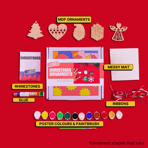 Christmas ornament making kit with MDF ornaments, rhinestones, glue, poster colors, paintbrush, and ribbons on a red background. Kitsters DIY Christmas Ornaments Kit available at Go Science product image 2
