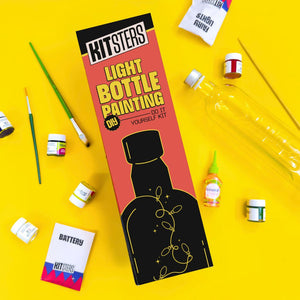 Kitsters light bottle painting DIY kit on a yellow background with paint bottles and brushes. Kitsters_Light_Bottle_Painting_Kit_at_go science_image 1