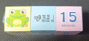 Three small boxes with a frog design and text on a dark background. NerdNerdy Sensory Cubes available at go science image 2