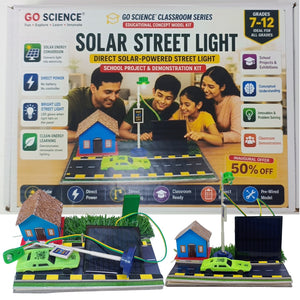GO Science Solar Street Light Classroom Model Kit set, showing the retail box behind and the assembled model kit components in front, including solar panels, small houses, cars, and a road demonstration base.
