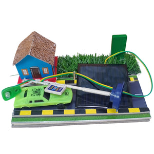 Solar Street Light School project model image 2 go science classroom series. A miniature solar car charging model kit featuring a green toy car, a black solar panel, a blue battery, a small blue house, and wiring on a white background.