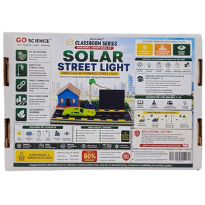 The back of the packaging box for the Go Science Classroom Street Light educational kit, featuring detailed instructions, diagrams, and a small model car and house illustration on a white background.