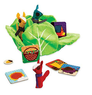 Colorful children's book with plush characters and cards on a white background