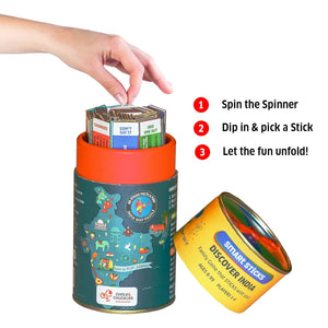 Colorful cylindrical container with a spinner and sticks, featuring text instructions on a white background. Chalk and Chuckles Smart Sticks Discover India product image 2