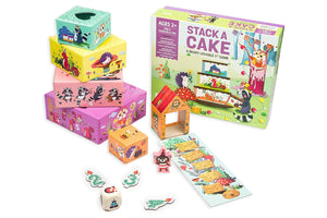 Stack a Cake game set with colorful boxes and game pieces on a white background