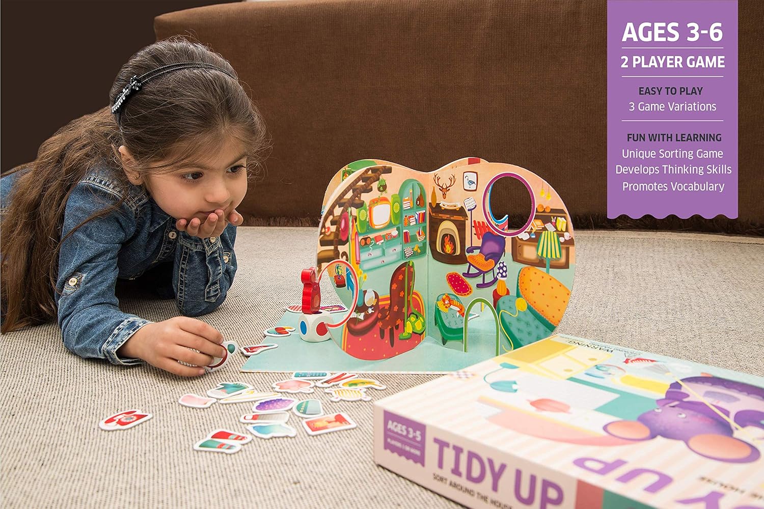 Child playing with a colorful board game on a couch