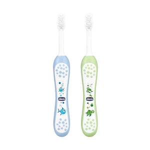 Two children's toothbrushes, one blue and one green, with cartoon designs on a white background. Chicco Toothbrush Set 6M to 36M Blue & Green Pack of 2 go littles