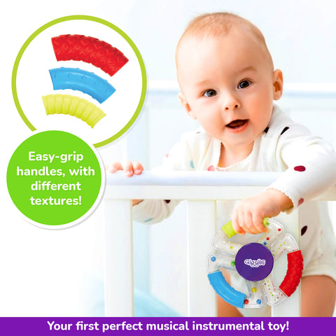 Funskool Giggles SENSORY RATTLE TRIO at go littles product image 2. Baby playing with a colorful toy featuring easy-grip handles and different textures.