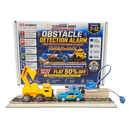 Go Science Classroom Series Obstacle Detection Alarm school project and demonstration kit, showing the product packaging box behind two toy vehicles (a yellow crane and a blue police car) on a track with a blue sensor. GO Science Classroom Series Obstacle Detection Alarm kit retail box of School project & demonstration retail box with kit assembled