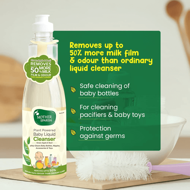 Mother Sparsh baby liquid cleanser bottle with cleaning tools on a kitchen counter. MotherSparsh Baby Liquid Cleanser Bottle175mlx2 (Buy 1 Get 1) go littles product image 2