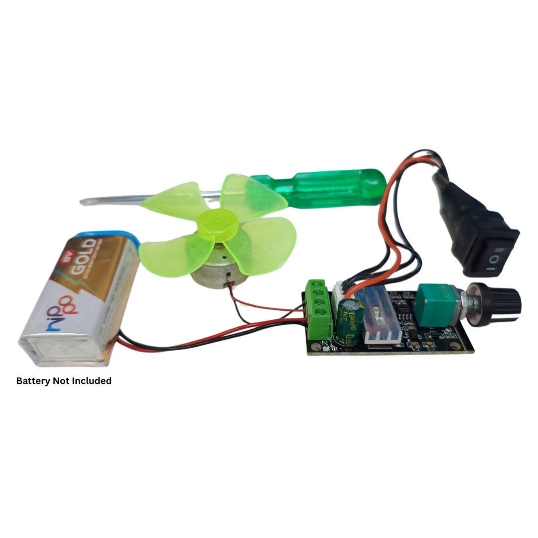 Motor kit for school project by go science classroom series. A DIY electronic project kit featuring a small green plastic fan, a black power switch, a green screwdriver, a green potentiometer, and a circuit board, shown with a 9V battery on a white background.