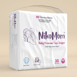 NikoMom baby premium tape diaper package on a beige background.  NikoMom Tape Diaper New Born go littles product main image
