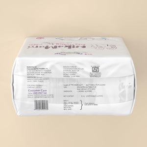Pack of Micromom diapers on a beige background.  NikoMom Tape Diaper New Born go littles product main image 2