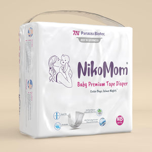 NikoMom baby premium tape diaper package on a beige background.  NikoMom Tape Diaper New Born go littles product main image 3