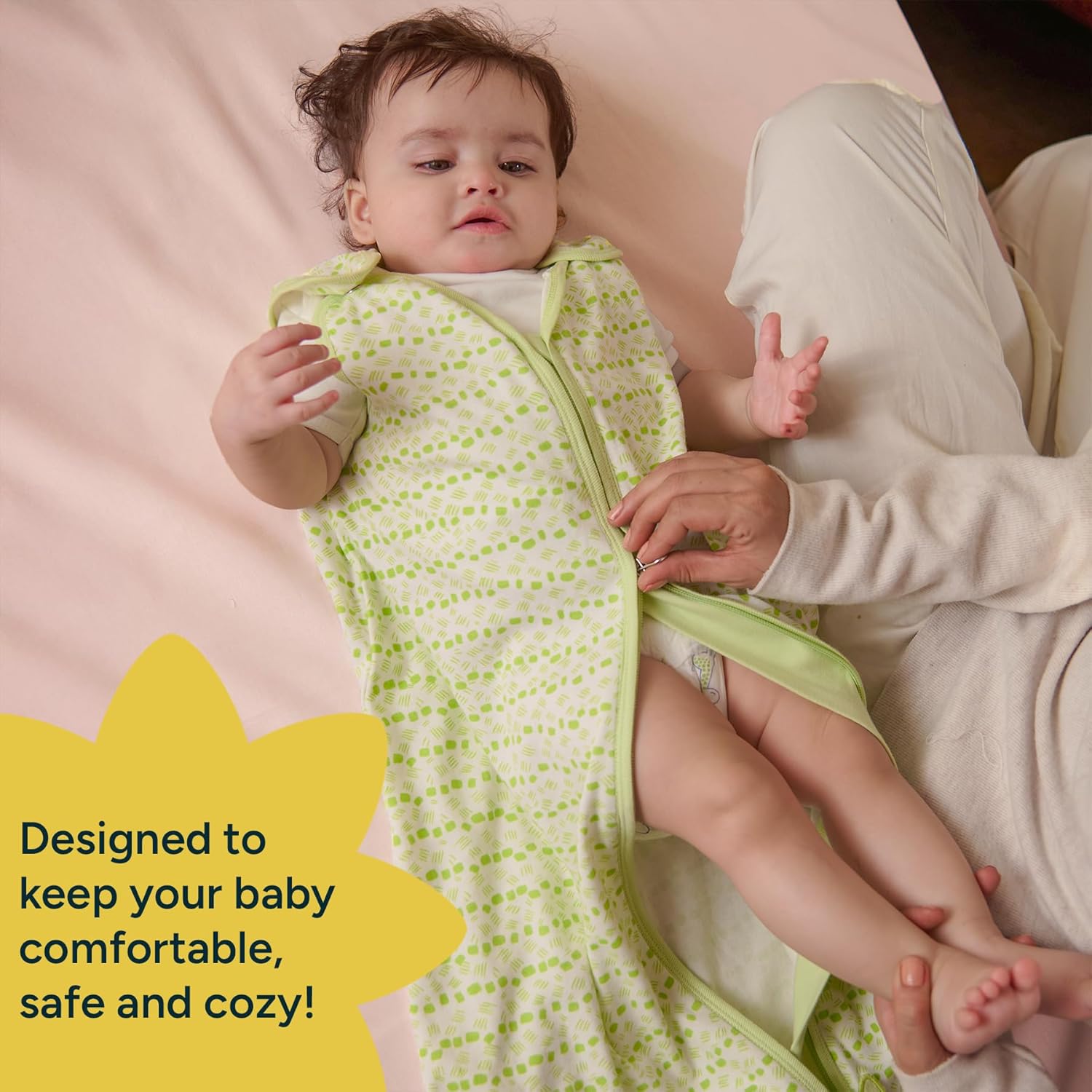 Baby in a green and white patterned swaddle with a yellow star graphic and text. Nintara 0.5 TOG Sleep Sack - Citrus Stripes (M) 9 - 15 Months go littles product image 7