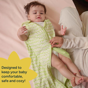 Baby in a green and white patterned swaddle with a yellow star graphic and text. Nintara 0.5 TOG Sleep Sack - Citrus Stripes (M) 9 - 15 Months go littles product image 7