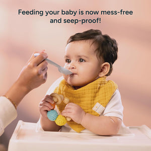 Baby being fed with a spoon, wearing a bib, with text 'Feeding your baby is now mess-free and seep-proof!' Nintara Baby Bandana Bibs  Set of 2 Golden Flutter Pack go littles product image 7