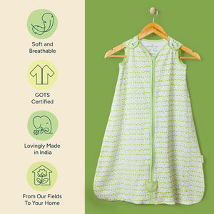Green baby sleeping bag with hanging hanger on green background, featuring certification icons and text. Nintara  Baby Sleep Sack 0.5 TOG Forest Flutter XL Size Go Littles product Image 4