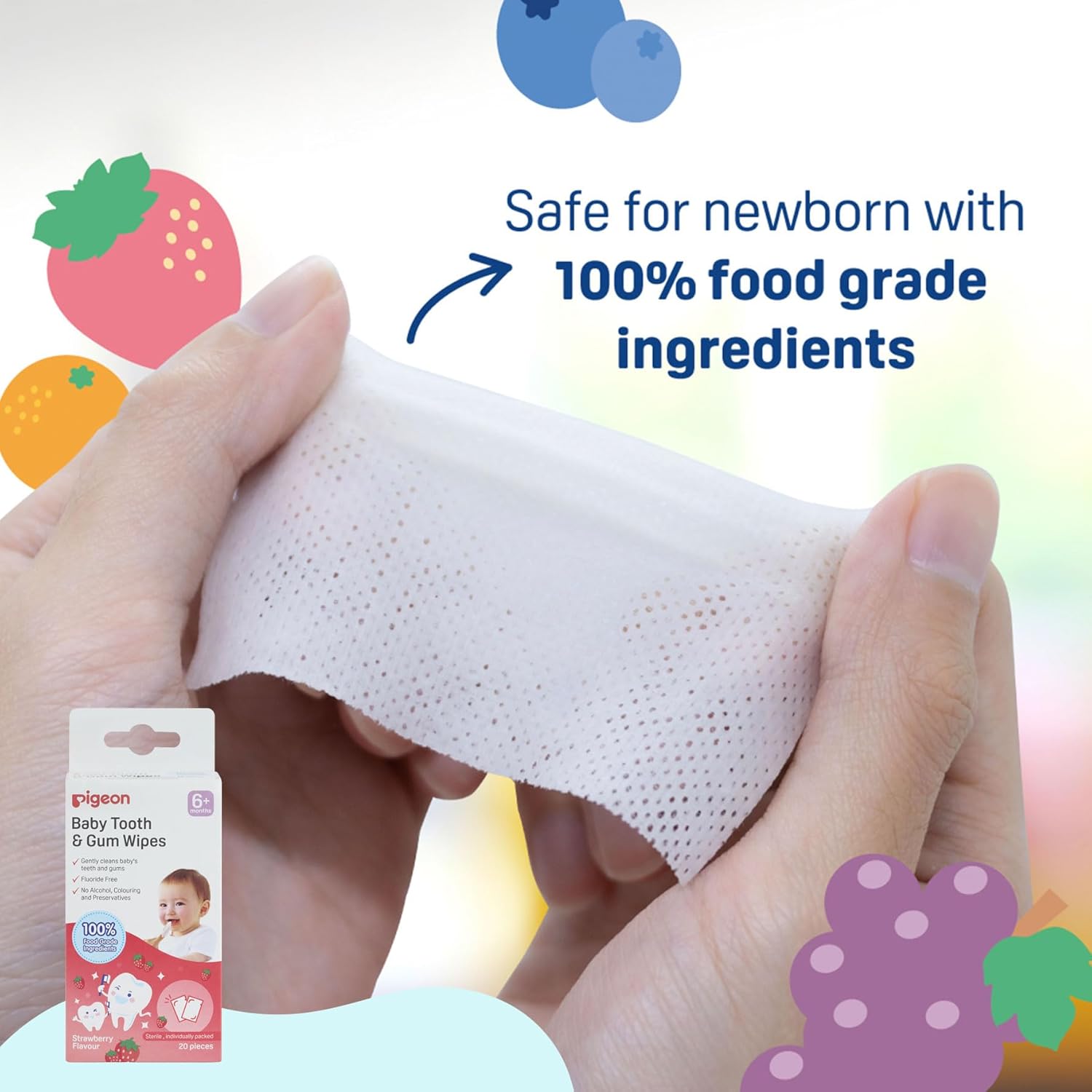 Baby tooth and gum wipes with packaging, held by a hand, on a colorful background. Pigeon Baby Tooth Gum Wipes Strawberry Flavor go littles product image 3
