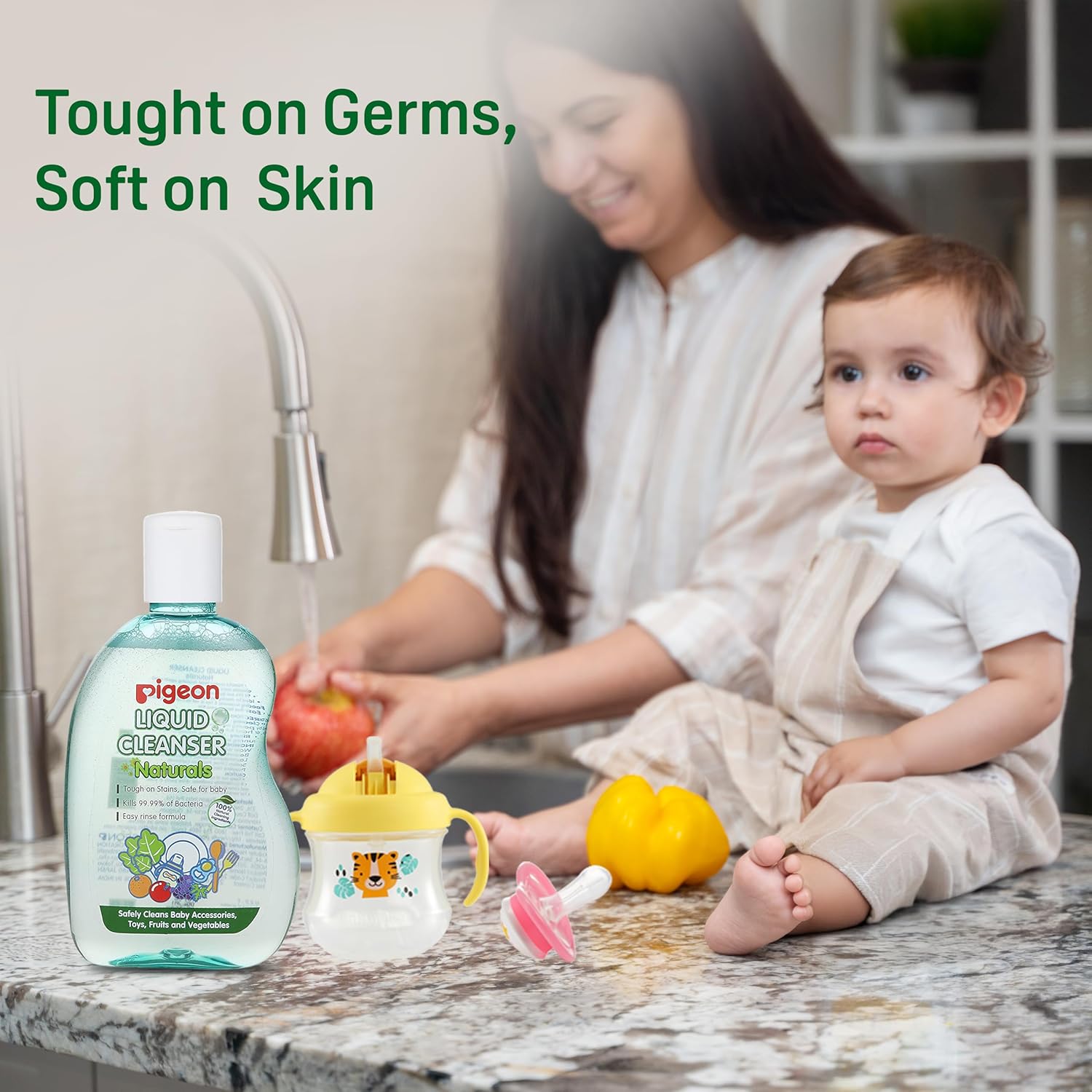 Woman washing fruits with a baby and Pigeon liquid cleanser on a kitchen counter. Pigeon Liquid Cleanser Bottle Naturals 200ml go littles product image 7