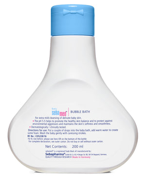 Bottle of Sebamed baby bubble bath with blue cap on a white background