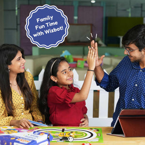 Family playing with educational toys and tablet, promoting Wizbot brand. Stempedia Wizbot Maxx Coding Ninja robot kit Coding kit for Kids  product image 6 available at go science