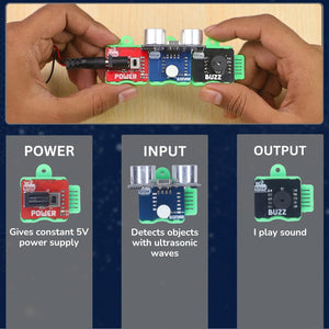 Hands holding a small electronic board with labeled components on a blue gradient background. WitBlox Sonar Ultrasonic Sensor Kit at Go Science image 7